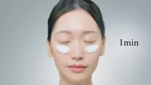 Illustration of a face with closed eyes with Micro Mousse Treatment under the eye area