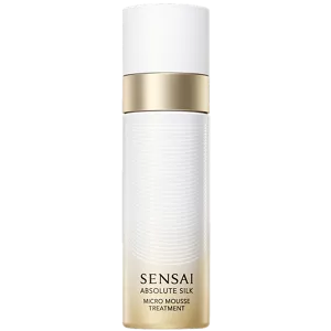 Absolute Silk Micro Mousse Treatment: a white and gold cylindrical aerosol dispenser with a gold gradient gold and a pull-off cap