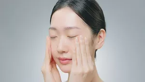 Illustration of applying Micro Mousse Treatment over the face with hands
