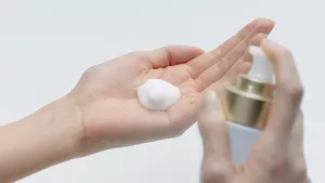Illustration of applying Micro Mousse Treatment over the face with hands