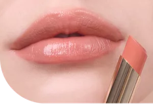 Close-up of a lip wearing Moisture Intense Lipstick in shade MI07 Coral Beige