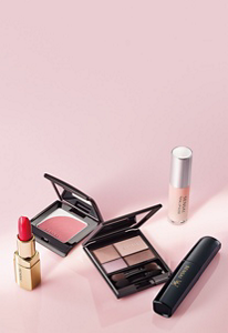 A range of make-up items from the Colours line on a pink background