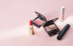 A range of make-up items from the Colours line on a pink background