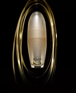 Elegant golden bottle surrounded by a luxurious golden swirl