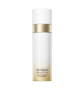 Absolute Silk Micro Mousse Treatment : a white and gold cylindrical aerosol dispenser with a gold gradient gold and a pull-off cap