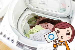 写真:良い事例 洗濯槽の7割程度まで洗濯物が入った洗濯機