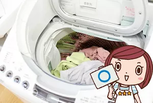 写真:良い事例 洗濯槽の7割程度まで洗濯物が入った洗濯機