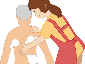 洗浄料を充分に泡立て、介助者が手でご利用者様の体を洗っている様子のイラスト