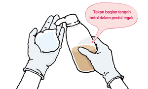 Tekan bagian tengah botol dalam posisi tegak