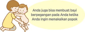Anda juga bisa membuat bayi berpegangan pada Anda ketika Anda ingin memakaikan popok
