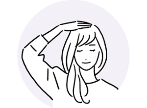 スプレーした直後に手で軽く押さえているイラスト