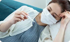 体温を測る妊婦