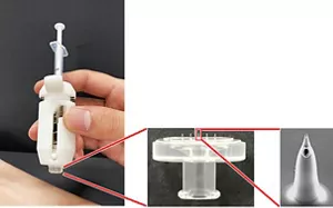 An overview and detailed close-up view of hollow microneedle.