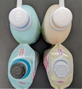 ポンプヘッドにキザミがあるシャンプー容器(左上)とポンプヘッドにキザミがないコンディショナー容器(右上) キャップ天面にキザミがあるシャンプーつめかえ容器(左下)とキャップ天面にキザミがないコンディショナーつめかえ容器(右下)