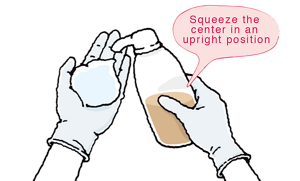 Squeeze the center in an upright position.