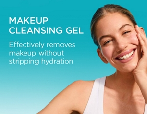 Woman with nourished skin against a teal background