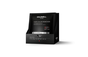 Goldwell System hair color remover in front of bright background