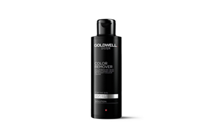 Goldwell System color remover for skin in front of bright background