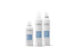 three goldwell stylesign volume products lined up horizontally in a row on a white background