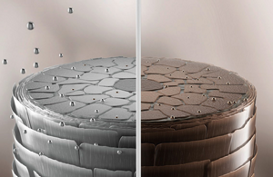 animated enlarged view of hair in horizontal cross-section divided into two halves, where the right half is a bit darker and the left half is lighter and shows silver drops acting on it