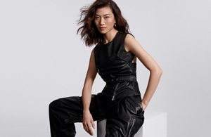 a package of goldwell stylesign naturally full and blowout and texture spray on a white background