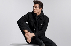 a package of goldwell stylesign naturally full and blowout and texture spray on a white background