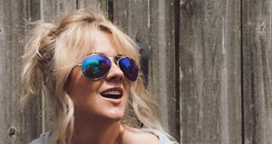 Blonde Woman Wearing Trendy Sunglasses