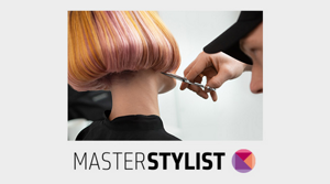 Orange and pink bob being cut with scissors by hair stylist