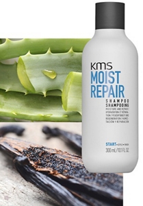 Moistrepair shampoo bottle infront of aloe vera and vanilla pods