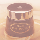 An early Kanebo product in brown packaging featuring the words, “Kanebo” and “MAY YOUNG”. 