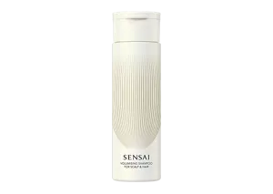 Volumising Shampoo in einer hellbeigen Flasche mit goldenen Akzenten und Klappverschluss  