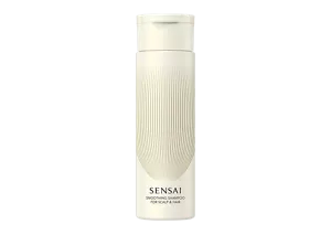 Smoothing Shampoo in einer beigen Flasche mit goldenen Akzenten und Klappverschluss  