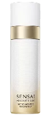 Absolute Silk Micro Mousse Treatment: ein weiß-goldfarbener, zylinderförmiger Sprühflakon mit einem goldenen Farbverlauf und einer abziehbaren Kappe