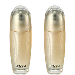 Ultimate Lotion I und II in goldenen Glasflakons mit Schraubverschluss vor schwarzem Hintergrund