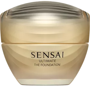 Ultimate The Foundation in einem geriffelten Glasbehälter mit Goldverlauf und Schraubverschluss