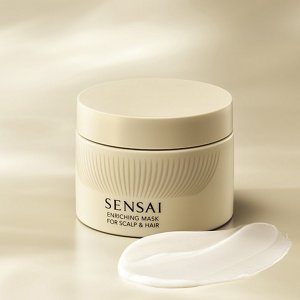 Enriching Mask jar with a rich cream texture displayed in front