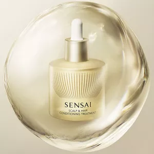 Scalp and Hair Conditioning Treatment, dargestellt in einer glänzenden goldenen Kugel