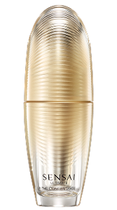 Ultimate The Concentrate: eine goldfarbene Glas-Pumpflasche mit Rillen und einem abziehbaren goldfarbenen Deckel