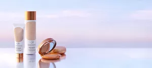 SILKY BRONZE products showcased against a vibrant sunset background.