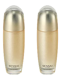 Ultimate Lotion I i II w złotych szklanych butelkach z zakrętkami na czarnym tle