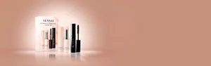 Lip and eye limited set with lip treatment stick and mascara in front of pink box