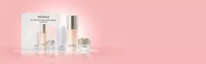 Lip care and double moisturising limited set with bottles and cream jar on pink background