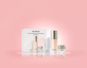 Lip care and double moisturising limited set with bottles and cream jar on pink background
