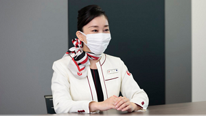 インタビューに回答する松本さんの写真