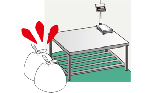 厨房内に廃棄物の入ったごみ袋が置きっぱなしになっているイラスト