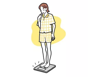 体重を気にしている女性のイラストイメージ