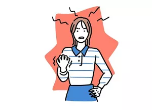 イライラしている女性のイラストイメージ