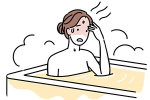 お湯に浸かってのぼせている女性イラストイメージ