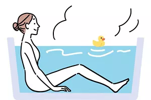 全身浴で肩まで浸かっている女性イラストイメージ