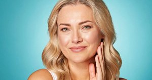 Beautiful woman in her 40s with slight signs of fine lines on her face